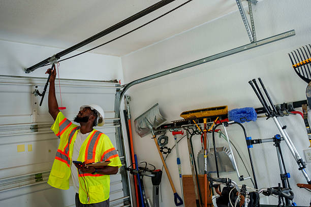 Professional Garage Door Panel Replacement technician working in Lewis County County, NY